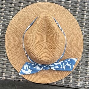 Stylish Tan Straw Hat with Blue Ribbon